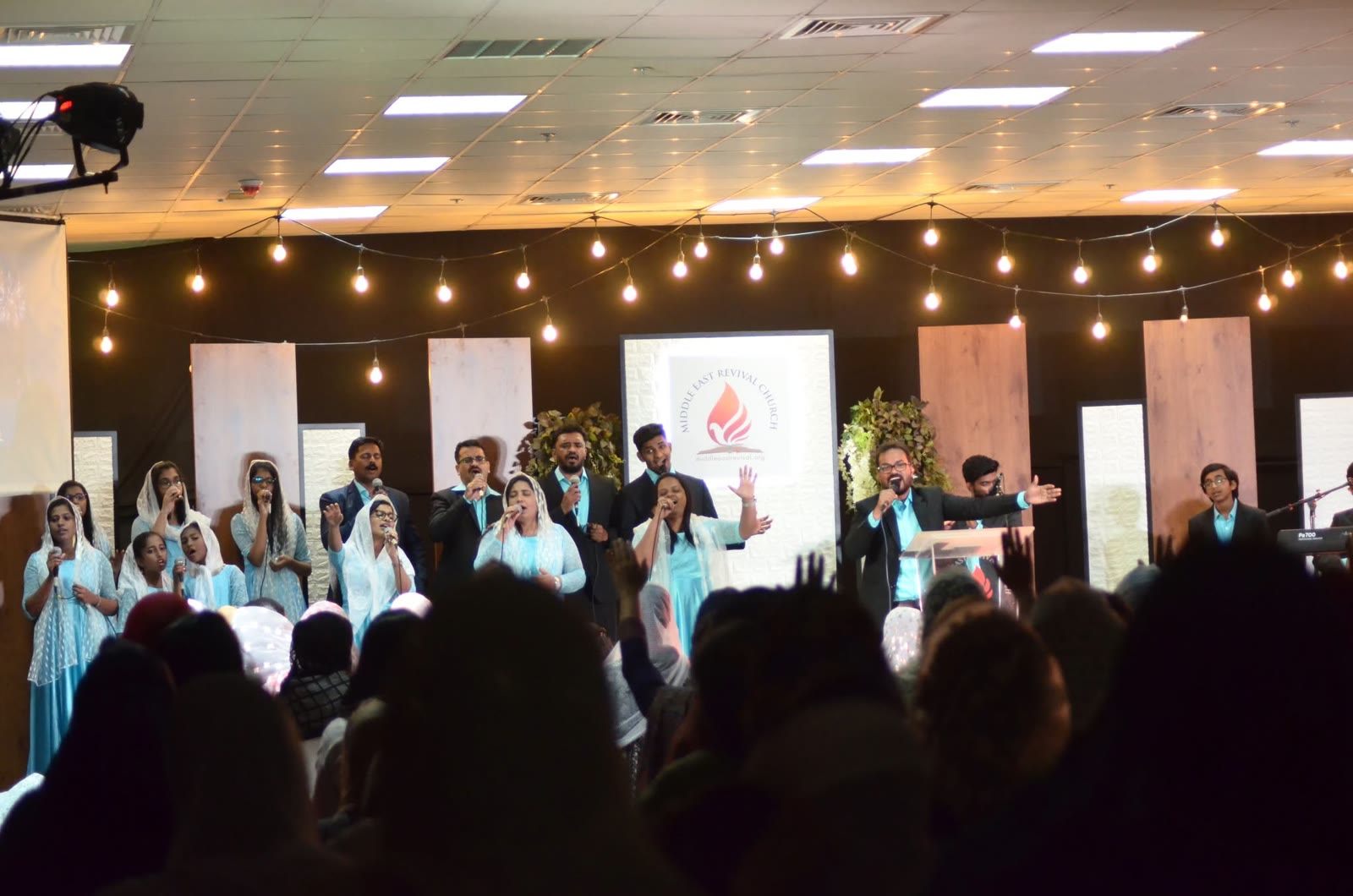 Worship team and choir leading praise at MERC Dubai
